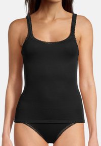 Black camisole with lace trim along the neckline and straps, made from a smooth, stretchy fabric. Paired with lace-trimmed black panties.