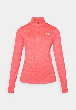 Pitkähiha, vetoketjulla varustettu urheilupaita heather-pinkissä kankaassa, jossa on valkoinen logo vasemmalla rinnalla ja sileä, kevyt rakenne.