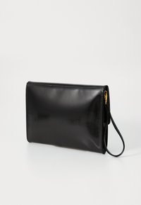 Black faux leather clutch with a smooth texture, rectangular shape, zip closure, and wrist strap. Minimalist design with no visible embellishments.