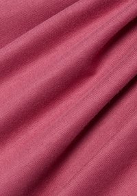 Pink fabric with a soft texture, features a smooth, knit pattern, and slight stretch. The surface shows subtle shading and depth.