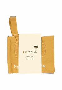Fabric book in mustard yellow organic cotton; features soft texture, tag, and embroidered details. Includes a circular fabric accent.