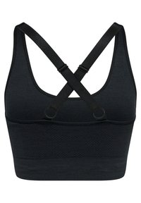 Svart sport-bh med korsade remmar, tillverkad av texturerat tyg. Har en sömlös design och justerbara detaljer för passform.