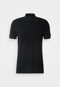 Polo noir à manches courtes avec deux boutons et logo BOSS en relief discret sur la poitrine gauche.