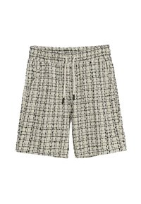 Shorts à carreaux noirs et blancs avec une taille élastique et un cordon de serrage, dotés d'un tissu texturé et d'une coupe décontractée.