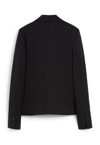 Blazer noir sur mesure avec manches longues, poignets boutonnés et col à revers vu de dos sur fond blanc.