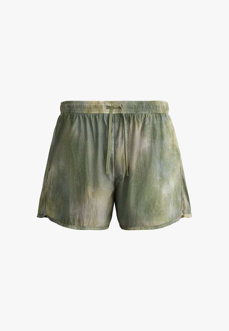 Shorts homme à cordon de serrage, coupe ample, motif tie-dye vert et gris avec fentes latérales sur chaque jambe.