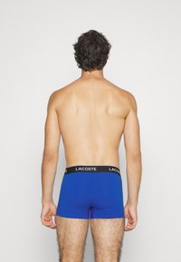 Lacoste 3 PACK - Chiloți boxer - jaune fluo/bleu/noir