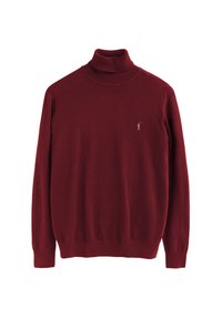 Vinröd polotröja i mjukt tyg, med långa ärmar och ribbad krage. Litet broderat logotyp på bröstet.