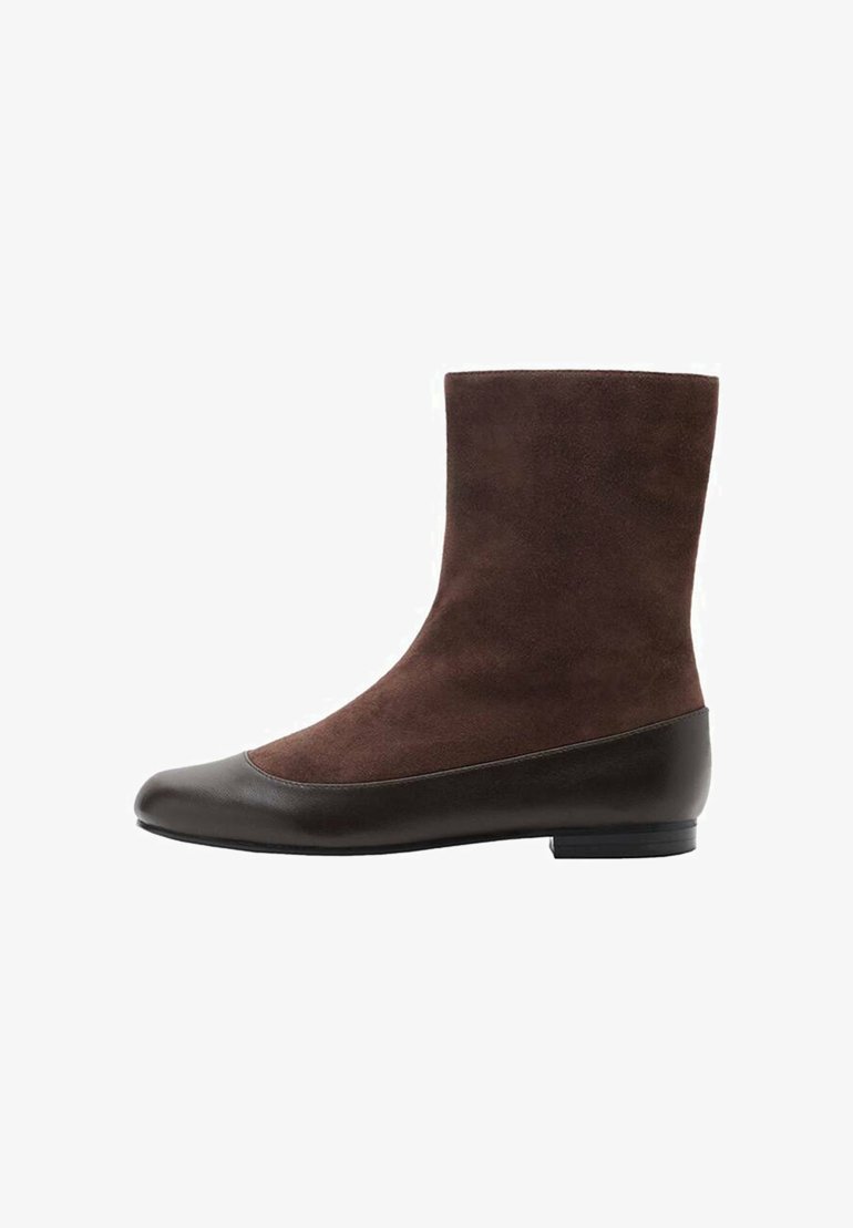 Brown ankle boots featuring a suede upper and smooth leather toe. The design is sleek with a flat sole and a minimalist aesthetic.