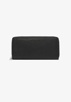 Portefeuille en cuir noir rectangulaire avec fermeture éclair sur tout le tour, nom de la marque discrètement embossé à l'avant et tirette de fermeture éclair argentée sur le côté.