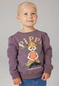 Felpa viola con maniche a sbuffo, caratterizzata da una grafica di Pippi Calzelunghe dai colori vivaci. Tessuto morbido e polsini a coste.