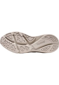 Sula i beige gummi med texturerade greppmönster, som har spår och kurvor för dragkraft. Varumärkeslogotyp präglad på hälområdet.