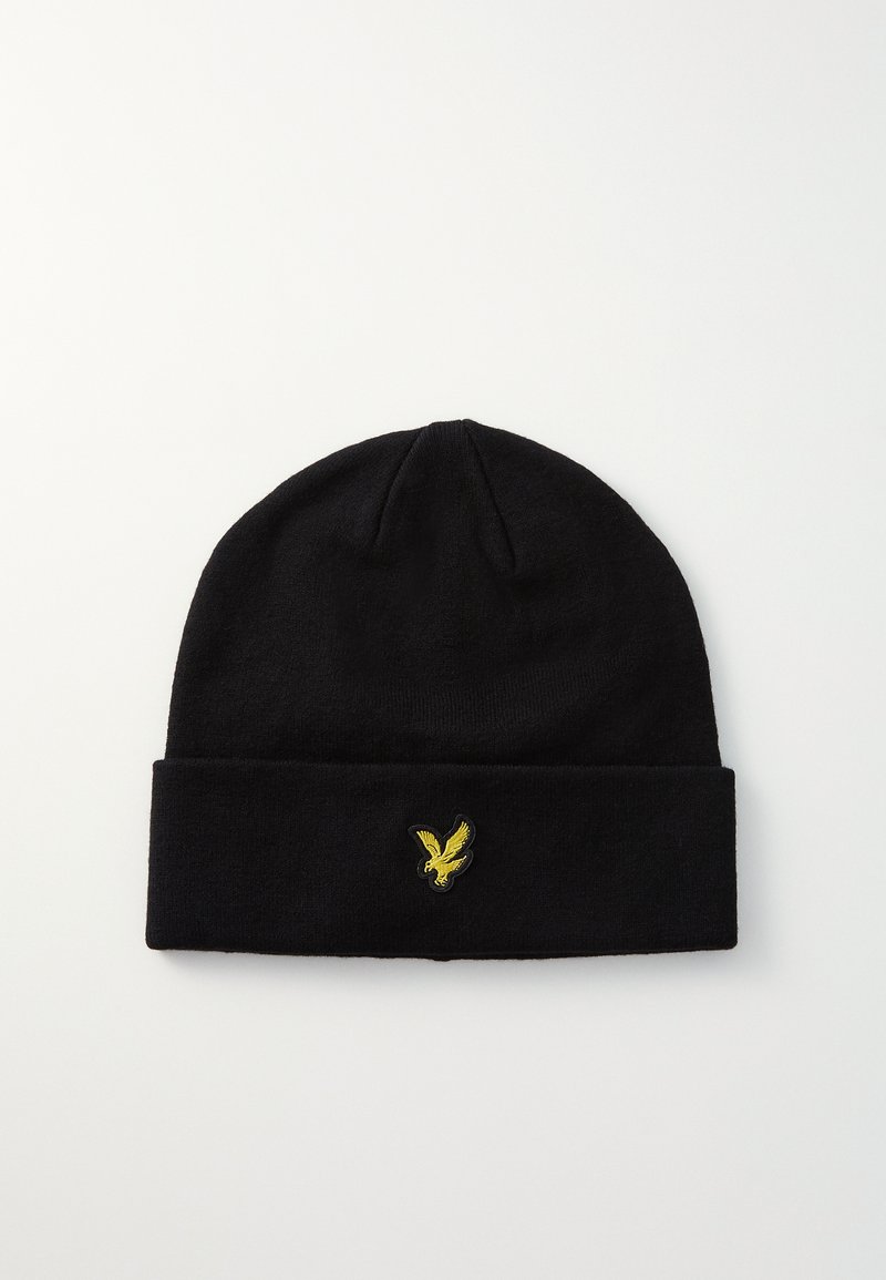 Czarny beanie wykonany z miękkiej dzianiny. Posiada podwinięty ściągacz i żółte haftowane logo orła z przodu.