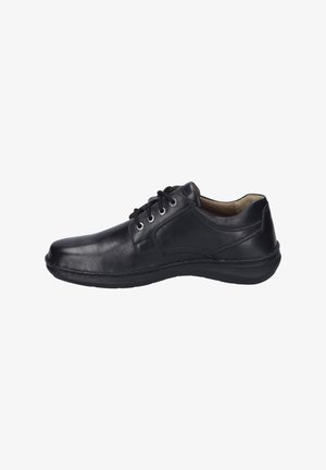 Zwarte leren schoen met ronde neus, vijf oogjes voor veters, gevoerde binnenzijde en een soepele afwerking; heeft een flexibele rubberen zool.