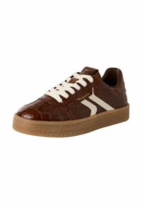 Brown crocodile-embossed sneakers with white laces and a textured beige platform sole. Features a logo on the side and back tab.