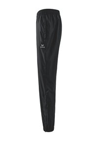 Zwarte polyester trainingsbroek met een elastische tailleband, zijzakken en subtiele logodetails bij de heup. Glad, lichtgewicht textuur.