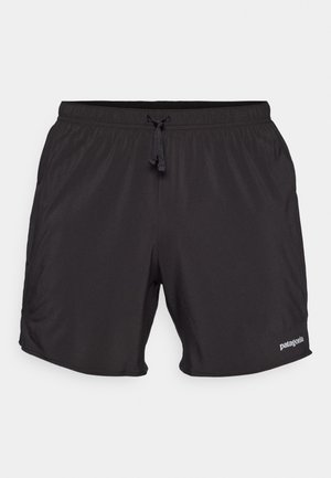 Sorte athletic shorts med elastisk talje og justerbar snøre. Glat stof med en diskret glans og sidelommer. Fler logo.
