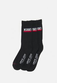 Drei Paare schwarzer Baumwollsocken mit einem weißen und roten Levi's-Logo in der Mitte und Größenangaben auf den Sohle.