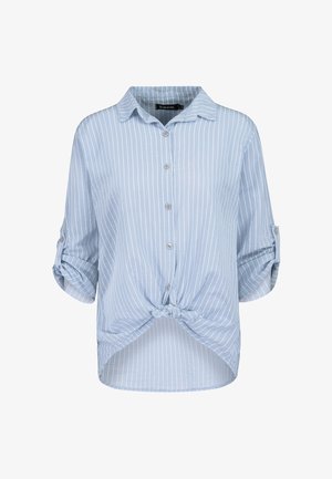 Light blue, short-sleeve button-up shirt with white stripes, knotted front detail, and rolled sleeves. Soft fabric with a casual silhouette.