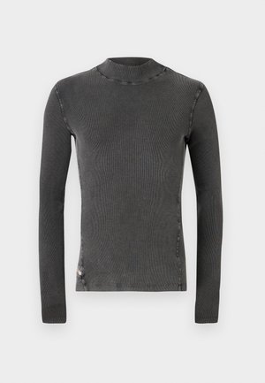 Gray long-sleeve top with a high neckline. Made from ribbed fabric with visible stitching details along the seams. Simple design, no patterns.