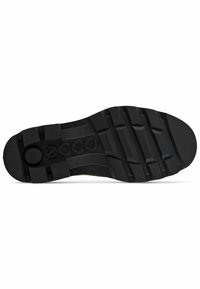 Suela de zapato de goma negra con un patrón texturizado. Presenta surcos pronunciados y un logo en relieve en el centro. Diseño resistente y duradero.