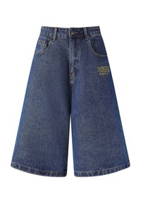 Denim shorts with a wide, loose fit in dark blue. Features yellow embroidered logo on the front and five pockets. Unfinished hem details.