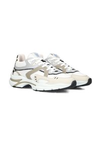 Chunky sneakers in white, gray, and beige mesh with black accents. Features rounded toe, textured panels, and lace-up closure.