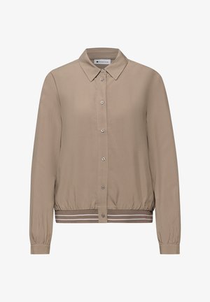 Chemise beige à manches longues avec col et ourlet rayé élastiqué, comprenant six boutons sur le devant et des manches avec poignets.