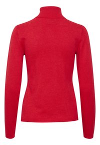 Sarkans turtlenecks ar mīkstu adījumu, aprīkots ar garām piedurknēm un ribotu apkakli. Gluda tekstūra ar pieguļošu dizainu.