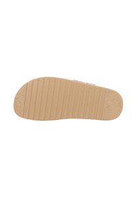 Sula av en sko med ett beige gummimaterial, strukturerad yta och horisontella ribbor för grepp; platt, något rundad tåområde.