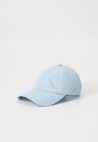 Light blue cotton baseball cap with a curved brim, stitched detailing, and a classic six-panel design. Soft texture and fitted style.