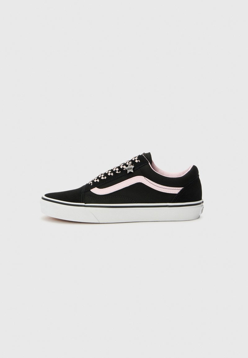 Black suede sneakers feature a pink side stripe, patterned laces, and white rubber sole. Design includes star-shaped hardware accent.