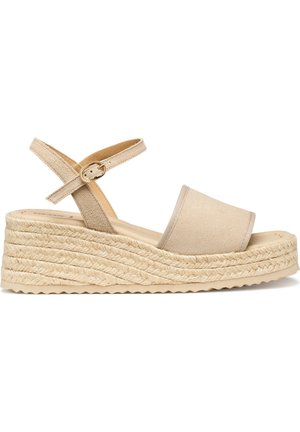 Sandale compensée beige avec plateforme en corde tressée, bride à l'avant ouverte et boucle réglable à la cheville sur fond blanc.