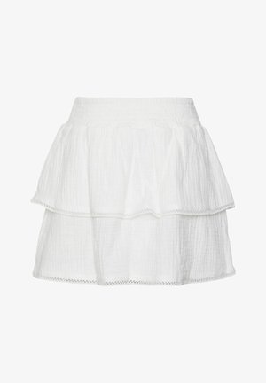Gonna bianca a strati con una fascia elastica in vita, realizzata in tessuto testurizzato, con un orlo ondulato e una delicata rifinitura lungo i bordi.