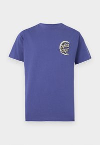Purple cotton T-shirt with short sleeves, featuring a circular logo that reads "SANTA CRUZ" in contrasting colors on the left chest.
