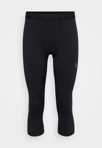 Black performance leggings made of smooth, stretchy material. Features a mid-calf length and a logo print on the lower leg.