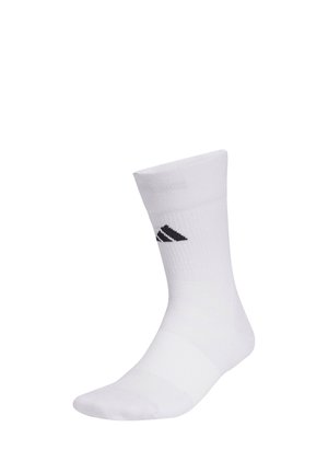 Weißer athletischer Sportsocken, der bis zur Mitte der Wade reicht, mit geripptem Muster und schwarzem Adidas-Logo an der Seite, vor einem weißen Hintergrund dargestellt.