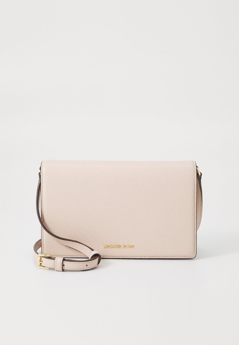 Beige textured leather crossbody bag with a detachable brown strap and gold logo accent. Compact rectangular shape; smooth zipper closure.