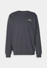 Felpa grigia realizzata in morbido cotone misto. Presenta polsini e orlo a costine, con il testo bianco "LOS BLANCOS" sul petto. Design pulito e minimalista.