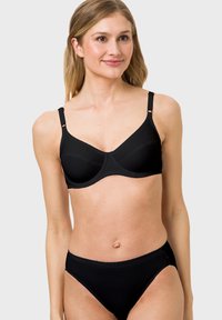 Black bra and matching high-waisted underwear set. Smooth fabric, underwire support, adjustable straps, and scalloped edges.