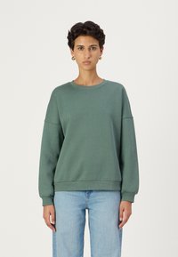 Vero Moda SONJA - Sportska majica - dark forest