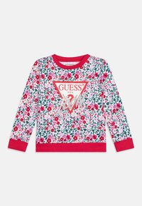 Floral patterned sweatshirt with a pink fabric, red accents, and a triangular logo featuring "GUESS" in the center. Long sleeves.
