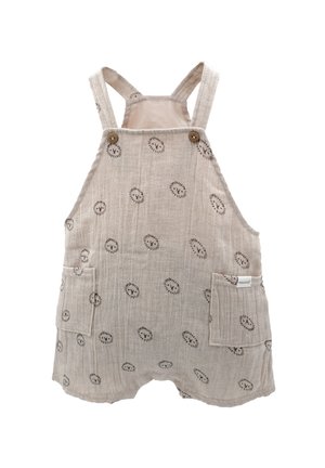 Beige Leinen-Overalls mit schwarzem Sonnenstrahlenmuster, verstellbaren Trägern, zwei Fronttaschen und Holzknopf-Akzenten.