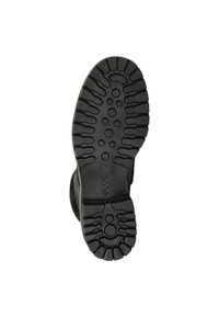 Sort gummisko sål med et mønsteret dæk for greb, med en glat, afrundet kant og en let hævet mellemsål for støtte.