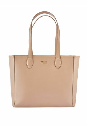 Beżowa skórzana torba na ramię z dwoma paskami na ramiona oraz małym złotym logo marki umieszczonym centralnie u góry.