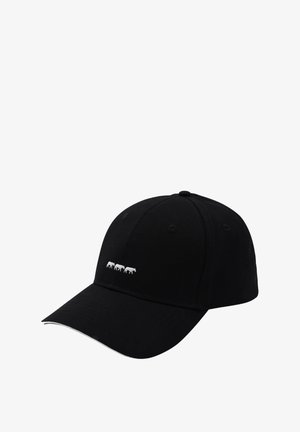 Casquette noire avec une visière incurvée, fabriquée en coton. Présente trois vaches blanches brodées sur le devant et de subtils accents blancs le long de la visière.