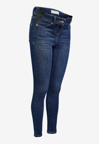 Kitsad teksad tumesinises denimis, millel on standardne vöökoht elastsete külgpaneelidega, minimaalne pleekimine ja klassikaline viie tasku disain.