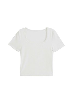 Witte geribde T-shirt met korte mouwen, met een vierkante halslijn en een getailleerde vorm. De stof heeft een zachte textuur met subtiele verticale lijnen.
