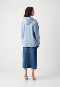 Scotch & Soda WASHED ARTWORK OVERSIZED HOODIE - Jersey con capucha - lake blue