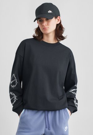 - Bluzka z długim rękawem